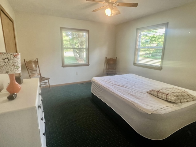 7125 S Military Rd, Grayling, MI 49738 - bedroom featuring carpet flooring and ceiling fan