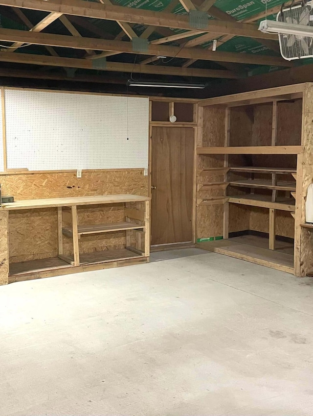 10279 N Sherman Rd, Frederic, MI 49733 - garage with a workshop area