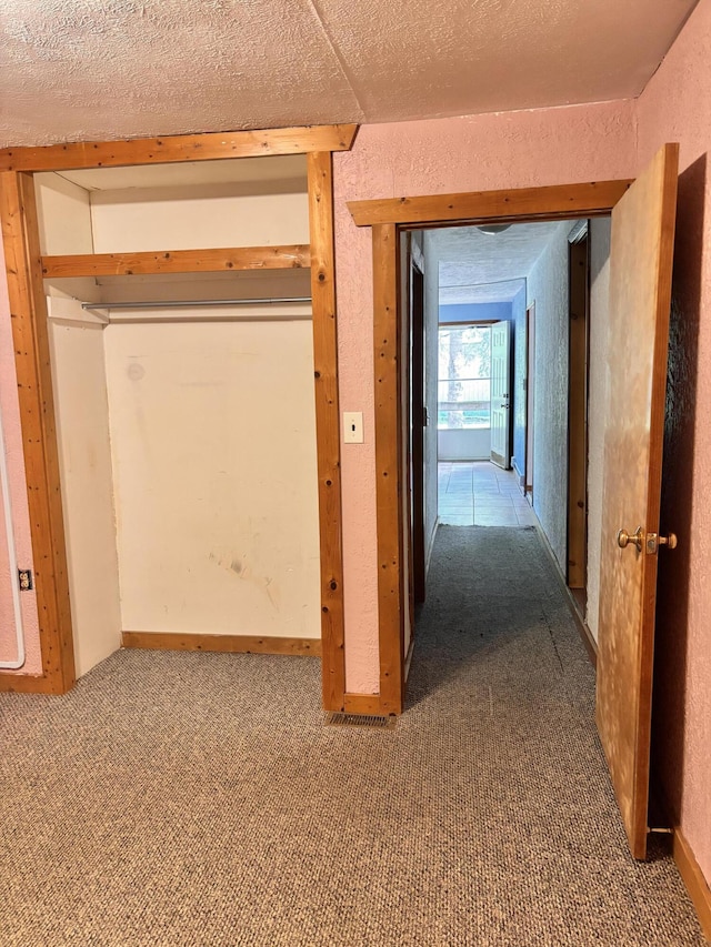 10279 N Sherman Rd, Frederic, MI 49733 - hallway with carpet