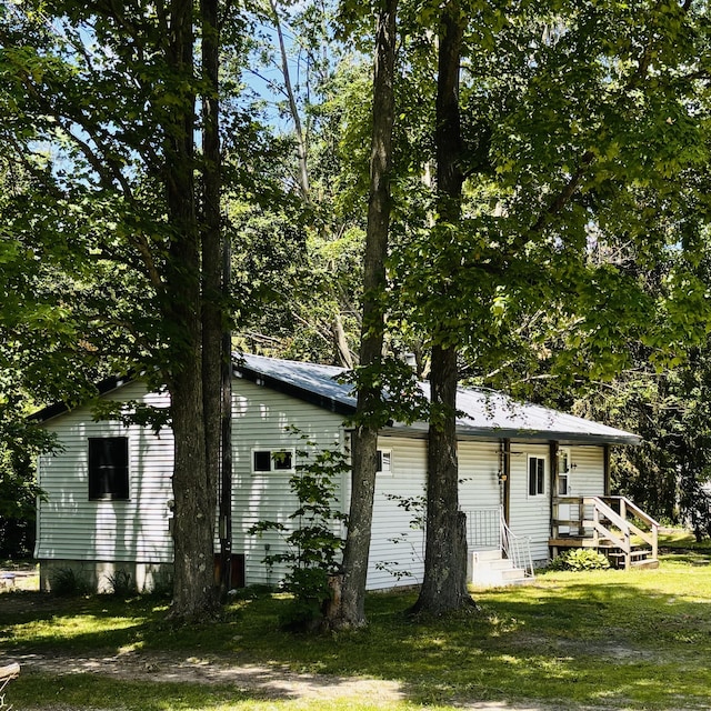 10279 N Sherman Rd, Frederic, MI 49733 - back of property with a yard