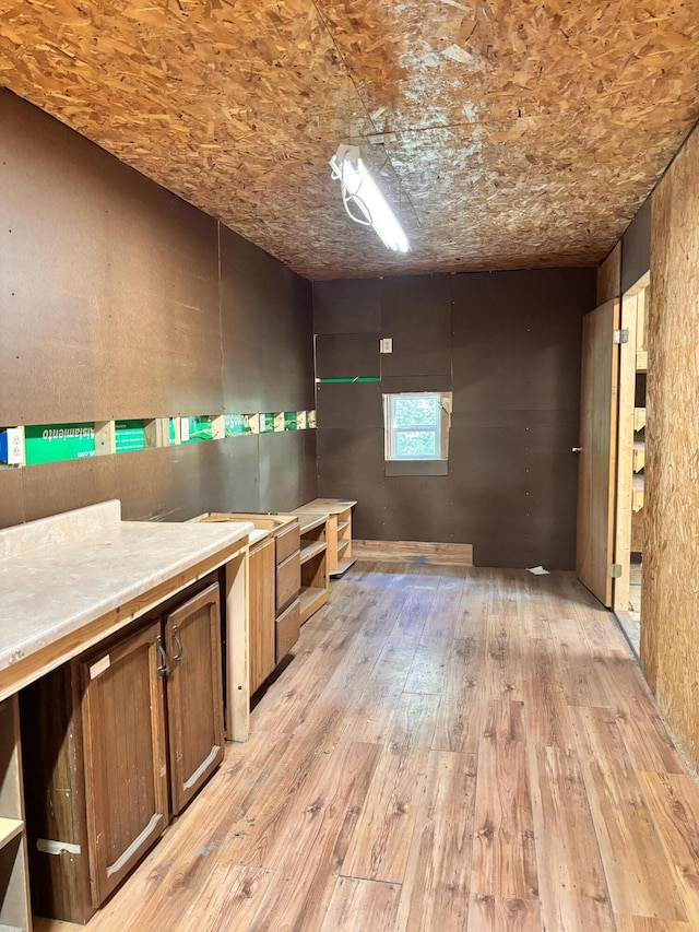 10279 N Sherman Rd, Frederic, MI 49733 - misc room with light wood-style floors