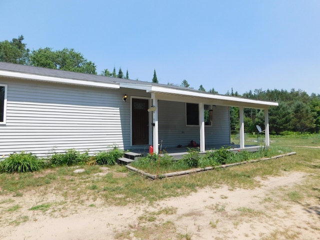 4616 Martin Dr, Frederic, MI 49733 - single story home featuring a porch