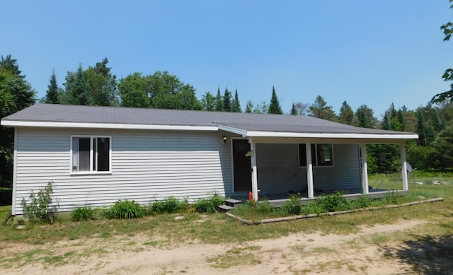 4616 Martin Dr, Frederic, MI 49733 - ranch-style home with covered porch