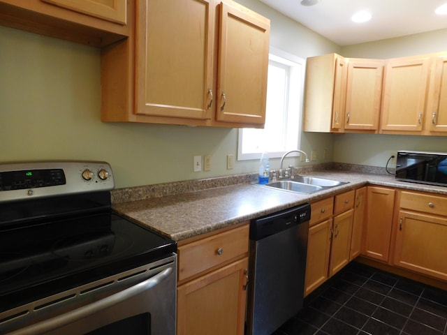 4616 Martin Dr, Frederic, MI 49733 - kitchen with stainless steel appliances, dark tile patterned flooring, light brown cabinets, and recessed lighting