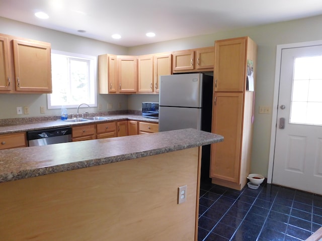 4616 Martin Dr, Frederic, MI 49733 - kitchen with dishwasher, light brown cabinets, dark tile patterned floors, and recessed lighting