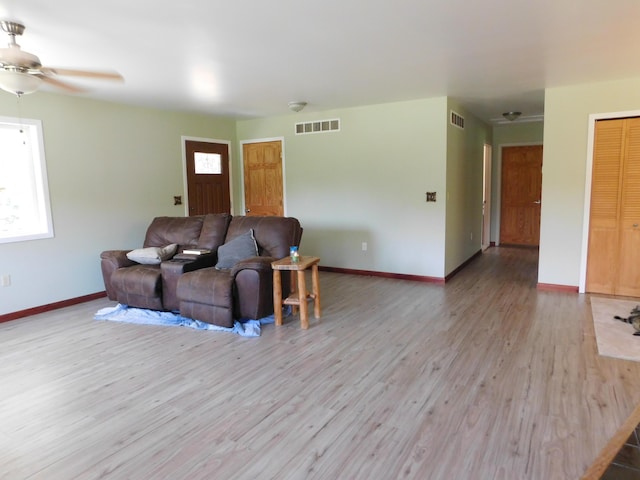 4616 Martin Dr, Frederic, MI 49733 - living room with wood finished floors and a ceiling fan