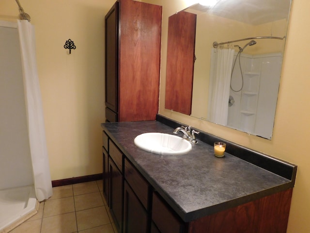 4616 Martin Dr, Frederic, MI 49733 - full bathroom with a shower with shower curtain, vanity, and tile patterned floors