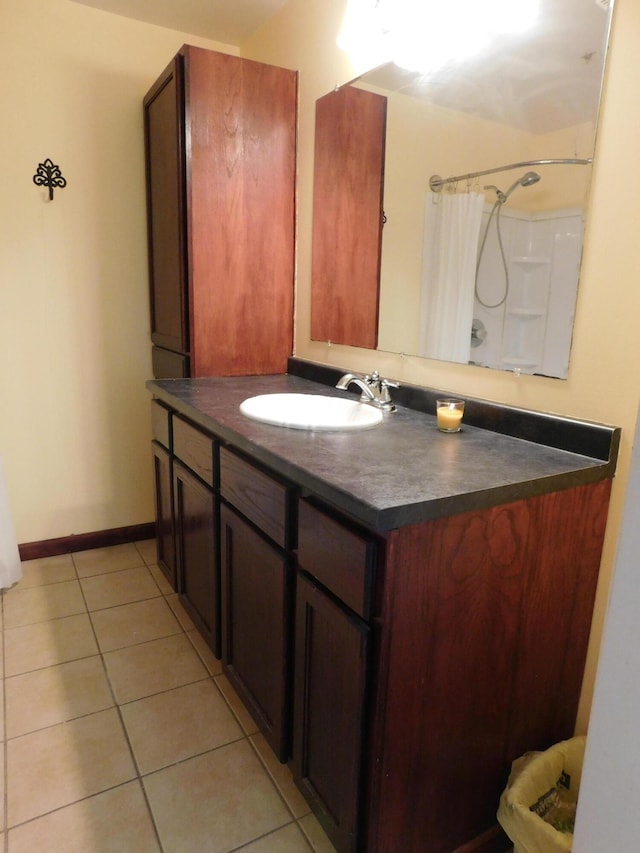 4616 Martin Dr, Frederic, MI 49733 - bathroom with vanity, tile patterned floors, and a shower with shower curtain