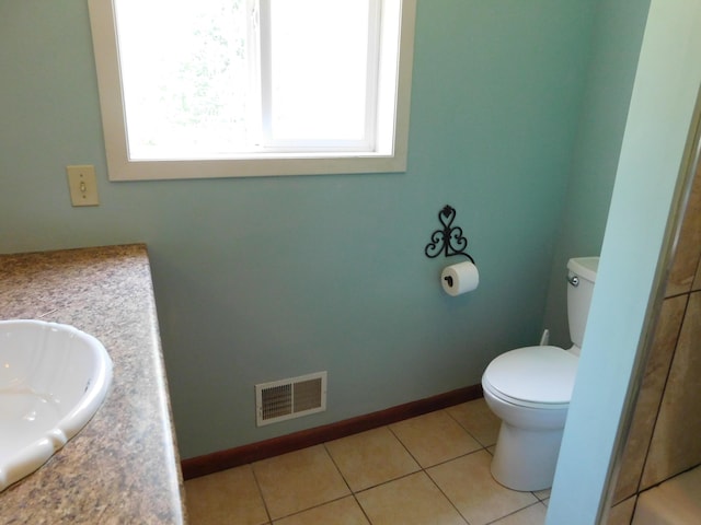 4616 Martin Dr, Frederic, MI 49733 - bathroom with vanity and tile patterned flooring