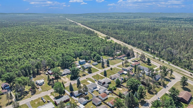 2145 Mustang St, Saint Helen, MI 48656 - aerial overview of property's location with a heavily wooded area