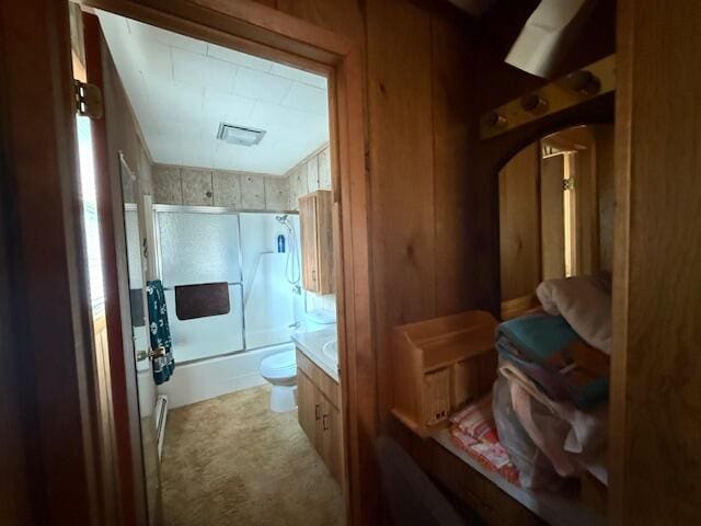 119 Ethel Dr, Roscommon, MI 48653 - bathroom with bath / shower combo with glass door and vanity