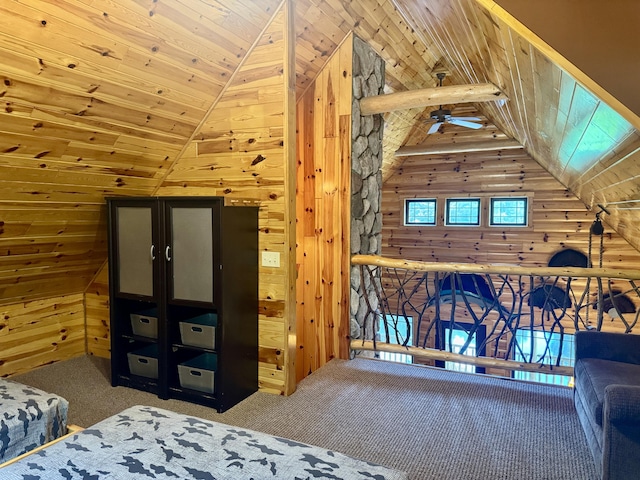 5283 Griffin Rd, Lewiston, MI 49756 - bedroom featuring vaulted ceiling, wooden walls, carpet floors, and wood ceiling