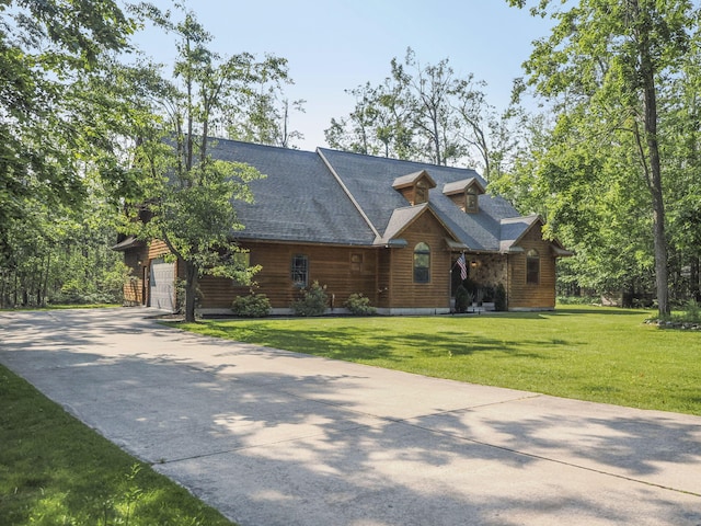 6552 High Trees Ct, Gaylord, MI 49735 - log-style house featuring driveway, a front lawn, and a shingled roof