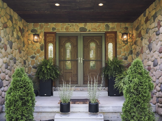 6552 High Trees Ct, Gaylord, MI 49735 - entrance to property featuring a porch and stone siding