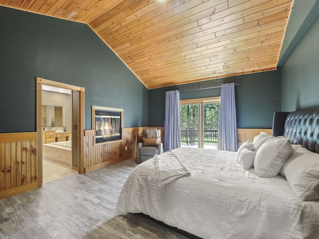 6552 High Trees Ct, Gaylord, MI 49735 - bedroom with wood ceiling, wainscoting, wooden walls, access to outside, and wood finished floors