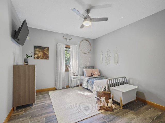 6552 High Trees Ct, Gaylord, MI 49735 - bedroom with wood finished floors and a ceiling fan