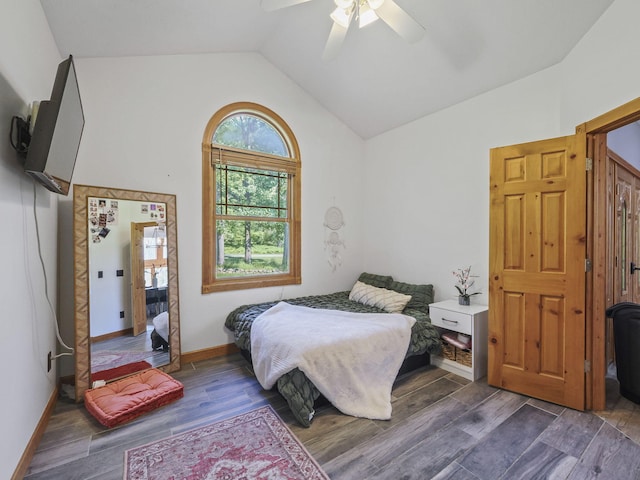 6552 High Trees Ct, Gaylord, MI 49735 - bedroom featuring vaulted ceiling, dark wood finished floors, and a ceiling fan