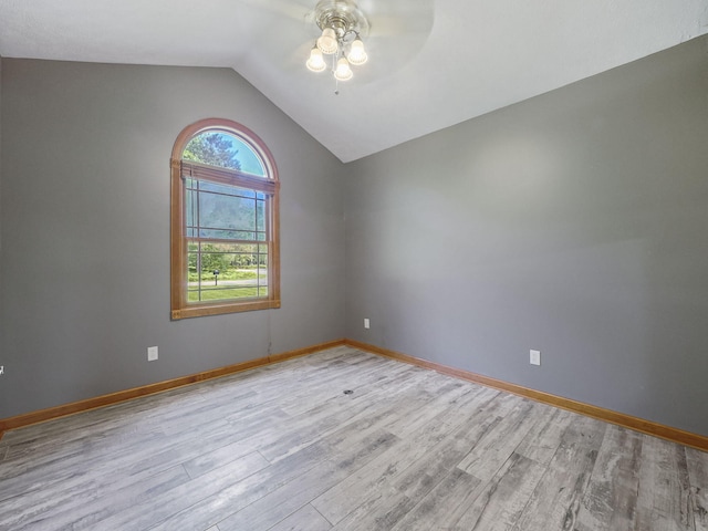 6552 High Trees Ct, Gaylord, MI 49735 - unfurnished room featuring ceiling fan, light wood finished floors, and vaulted ceiling