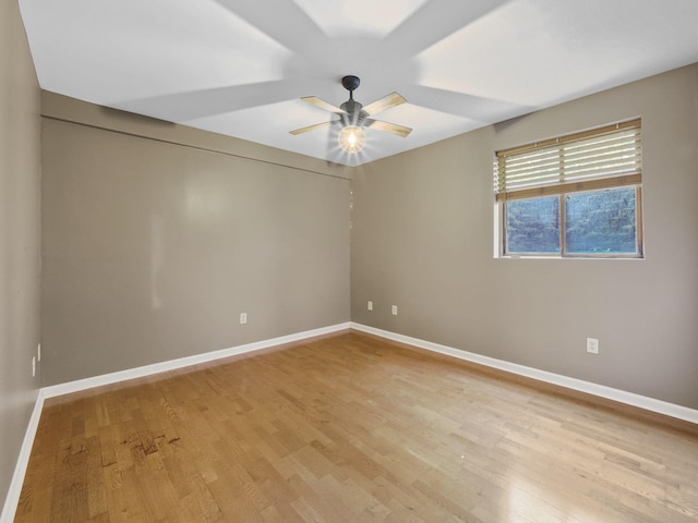 6552 High Trees Ct, Gaylord, MI 49735 - spare room featuring a ceiling fan and light wood-type flooring