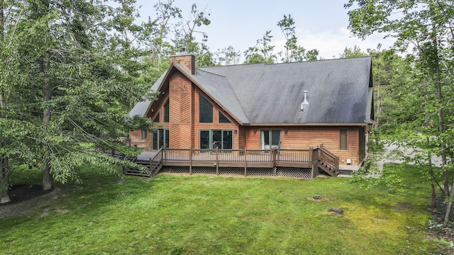 6552 High Trees Ct, Gaylord, MI 49735 - back of house with a chimney, a yard, a deck, and a shingled roof