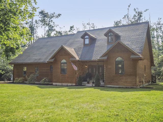 6552 High Trees Ct, Gaylord, MI 49735 - view of front of home with a front lawn and roof with shingles