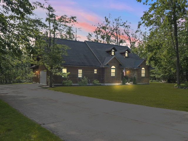 6552 High Trees Ct, Gaylord, MI 49735 - view of front of home with driveway and a yard
