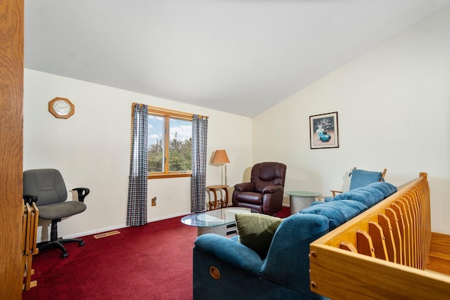 2829 Kassuba Rd, Gaylord, MI 49735 - living room featuring carpet floors and lofted ceiling