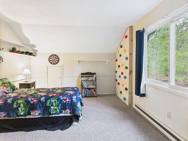5589 Algonquin Rd, Gaylord, MI 49735 - carpeted bedroom with baseboard heating and vaulted ceiling