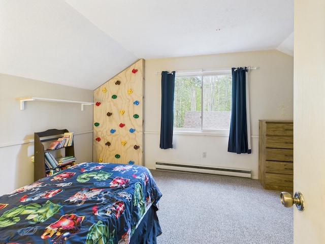 5589 Algonquin Rd, Gaylord, MI 49735 - carpeted bedroom featuring a baseboard radiator and lofted ceiling
