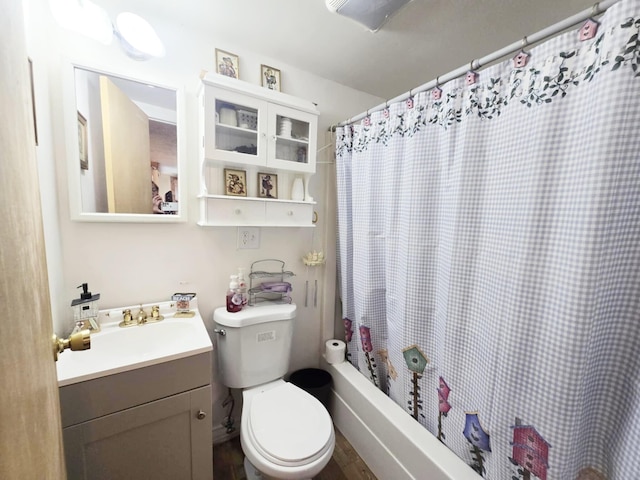 6416 Jimary Ln, Gladwin, MI 48624 - full bath featuring vanity, shower / tub combo, and wood finished floors