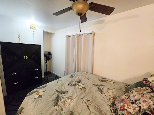 6416 Jimary Ln, Gladwin, MI 48624 - bedroom with carpet floors and a ceiling fan