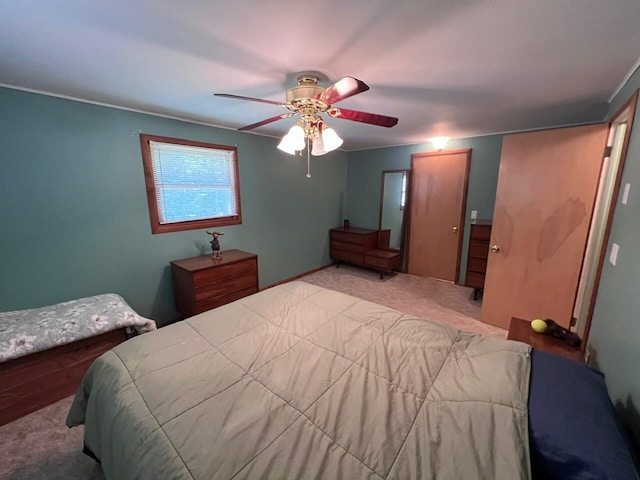 332 Pingree St, Roscommon, MI 48653 - carpeted bedroom with a ceiling fan