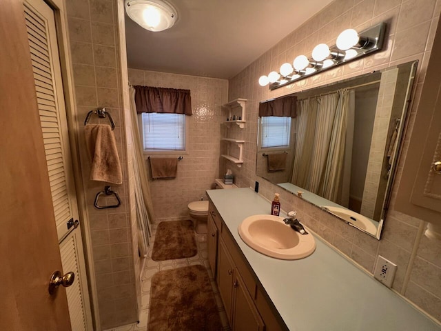 332 Pingree St, Roscommon, MI 48653 - bathroom with tile walls, vanity, curtained shower, tile patterned flooring, and decorative backsplash