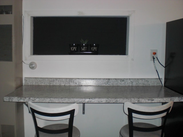 557 Davis St, Lake, MI 48632 - detailed view of a heating unit and an office area