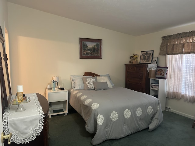 362 N Addison St, Alpena, MI 49707 - carpeted bedroom with baseboards
