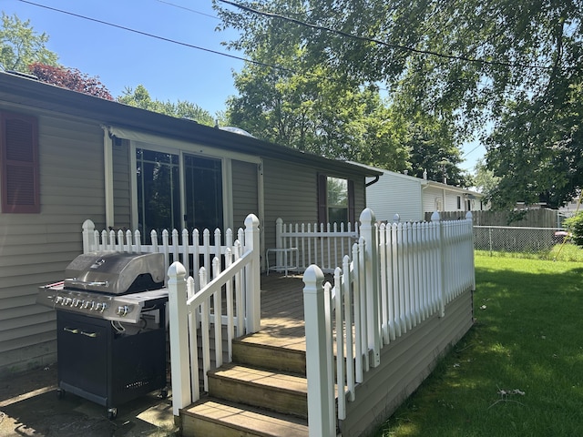 362 N Addison St, Alpena, MI 49707 - wooden terrace with a grill