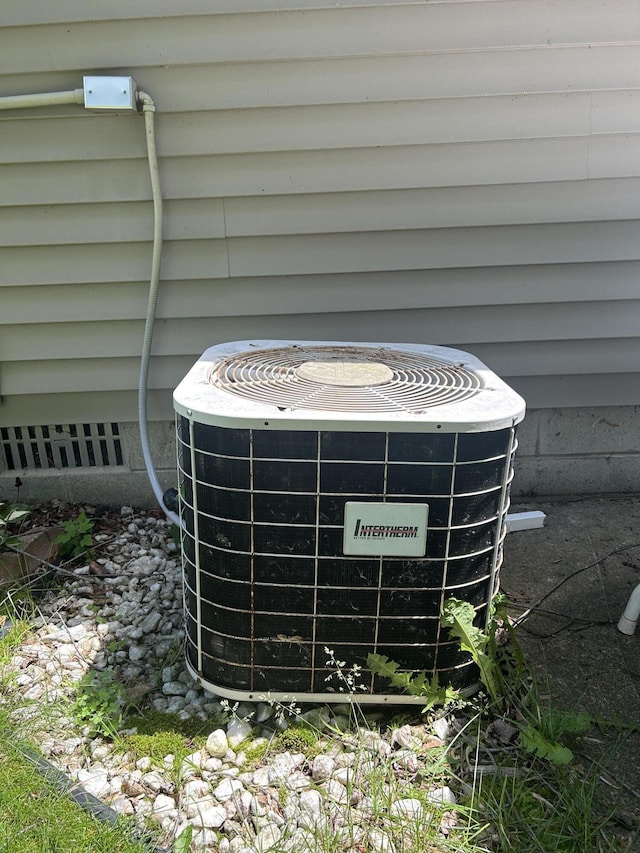 362 N Addison St, Alpena, MI 49707 - exterior view of a cooling unit