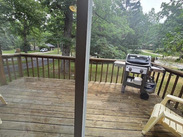 1300 Geesey Ave, Mio, MI 48647 - wooden terrace featuring a grill