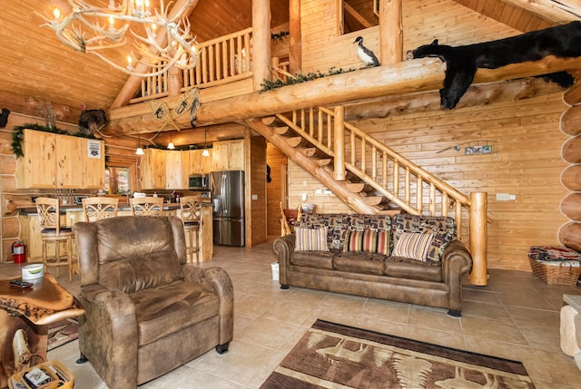 23 Treasure Is, Roscommon, MI 48653 - living room featuring high vaulted ceiling, wood walls, wooden ceiling, light tile patterned floors, and a chandelier