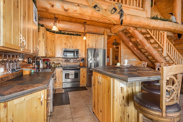 23 Treasure Is, Roscommon, MI 48653 - kitchen featuring appliances with stainless steel finishes, wood counters, wood ceiling, a kitchen breakfast bar, and tile patterned floors