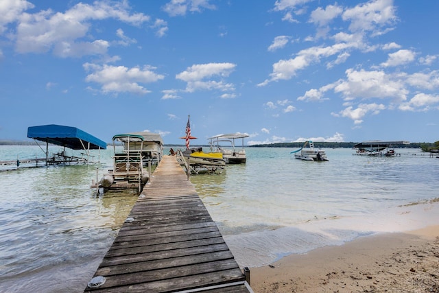 23 Treasure Is, Roscommon, MI 48653 - dock area with a water view and boat lift