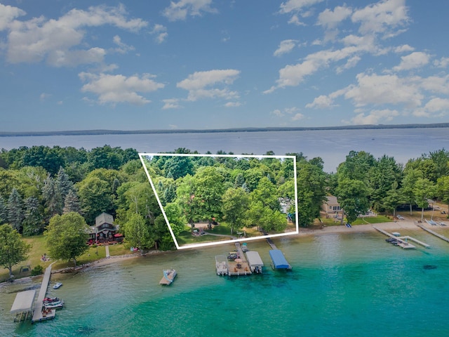 23 Treasure Is, Roscommon, MI 48653 - aerial view of property's location with property parcel outlined and a large body of water