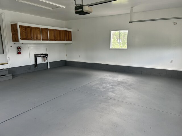 2503 W Hubbard Lake Trl, Hubbard Lake, MI 49747 - garage with a garage door opener