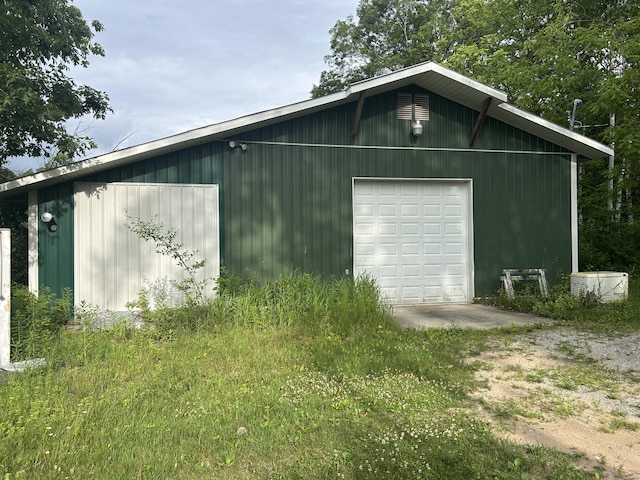 2503 W Hubbard Lake Trl, Hubbard Lake, MI 49747 - view of outbuilding featuring driveway