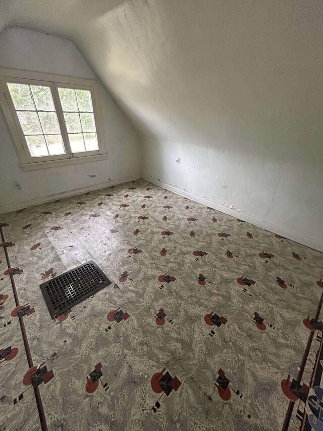 302 S Vine St, Mio, MI 48647 - bonus room featuring vaulted ceiling