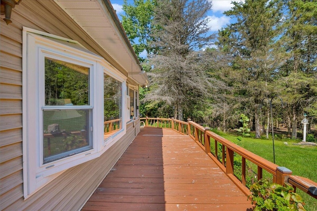 2951 N Palmer Rd, Onaway, MI 49765 - wooden deck with a yard