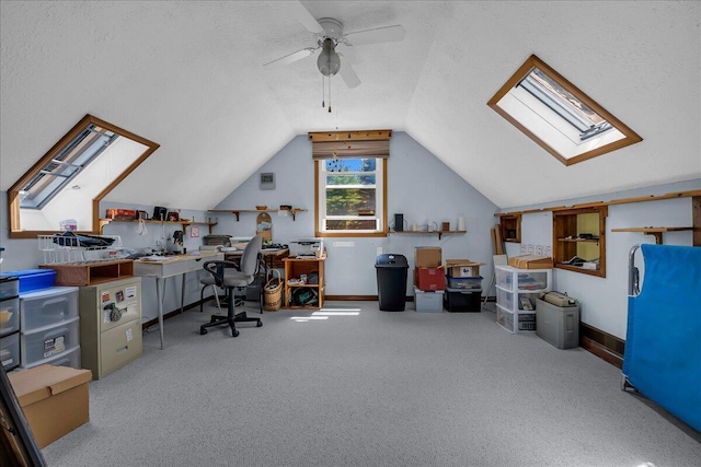 2951 N Palmer Rd, Onaway, MI 49765 - office area featuring carpet, a skylight, lofted ceiling, and ceiling fan