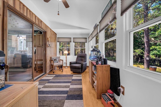 2951 N Palmer Rd, Onaway, MI 49765 - sunroom with wood finished floors and lofted ceiling