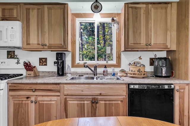 2951 N Palmer Rd, Onaway, MI 49765 - kitchen featuring white appliances and backsplash