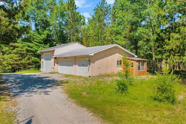 2951 N Palmer Rd, Onaway, MI 49765 - view of side of property featuring driveway